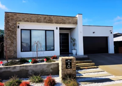 Modern house with a stone accent facade